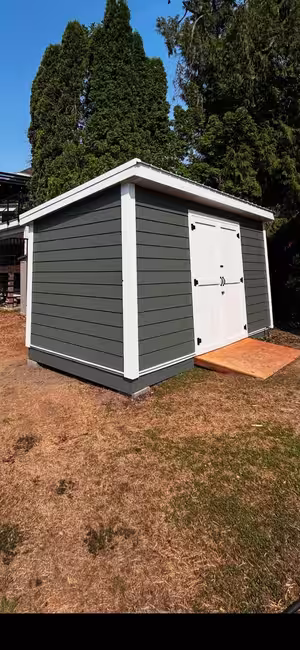 Grey shed with ramp, photo 1 of 2